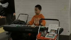 Young Boy Shows Off His Musical Piano Talent In A NYC Subway Station