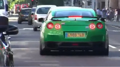 Grass green Nissan R35 GTR driving on the streets of London