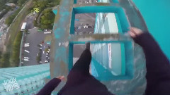 Daredevil Hangs Off Skyscraper