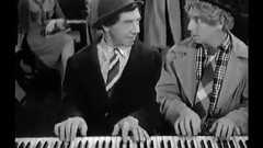 Harpo And Chico pianos——The Marx Brothers