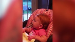 Baby Adorably Disagrees With Dad