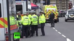 Fully-armed police officers swarm roads near London attack sites